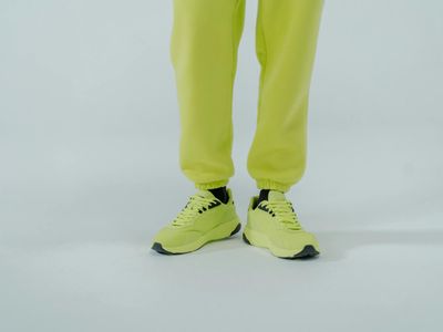 Minimalist training space with neon lime lighting